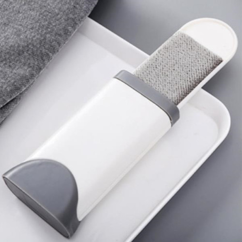 Portable hair catcher lint brush
